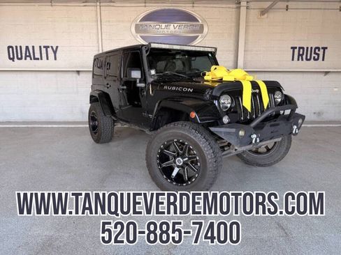 Used 2014 Jeep Wrangler Unlimited Sahara AWD/4WD image 1