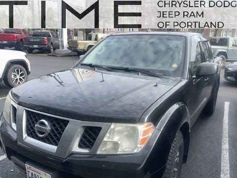 Used 2014 Nissan Frontier PRO-4X image 1