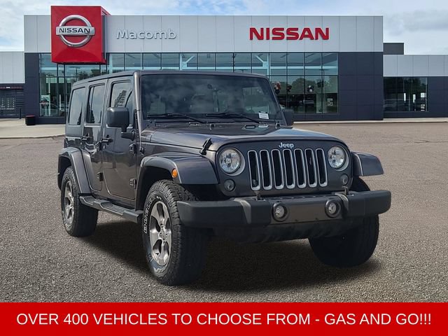 Used 2016 Jeep Wrangler Unlimited Sahara w/ Dual Top Group AWD/4WD image 1