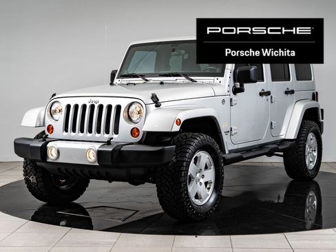 Used 2011 Jeep Wrangler Unlimited Sahara w/ Trailer Tow Group AWD/4WD image 1