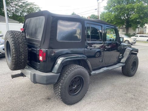 Used 2012 Jeep Wrangler Unlimited Sahara w/ Dual Top Group AWD/4WD image 6