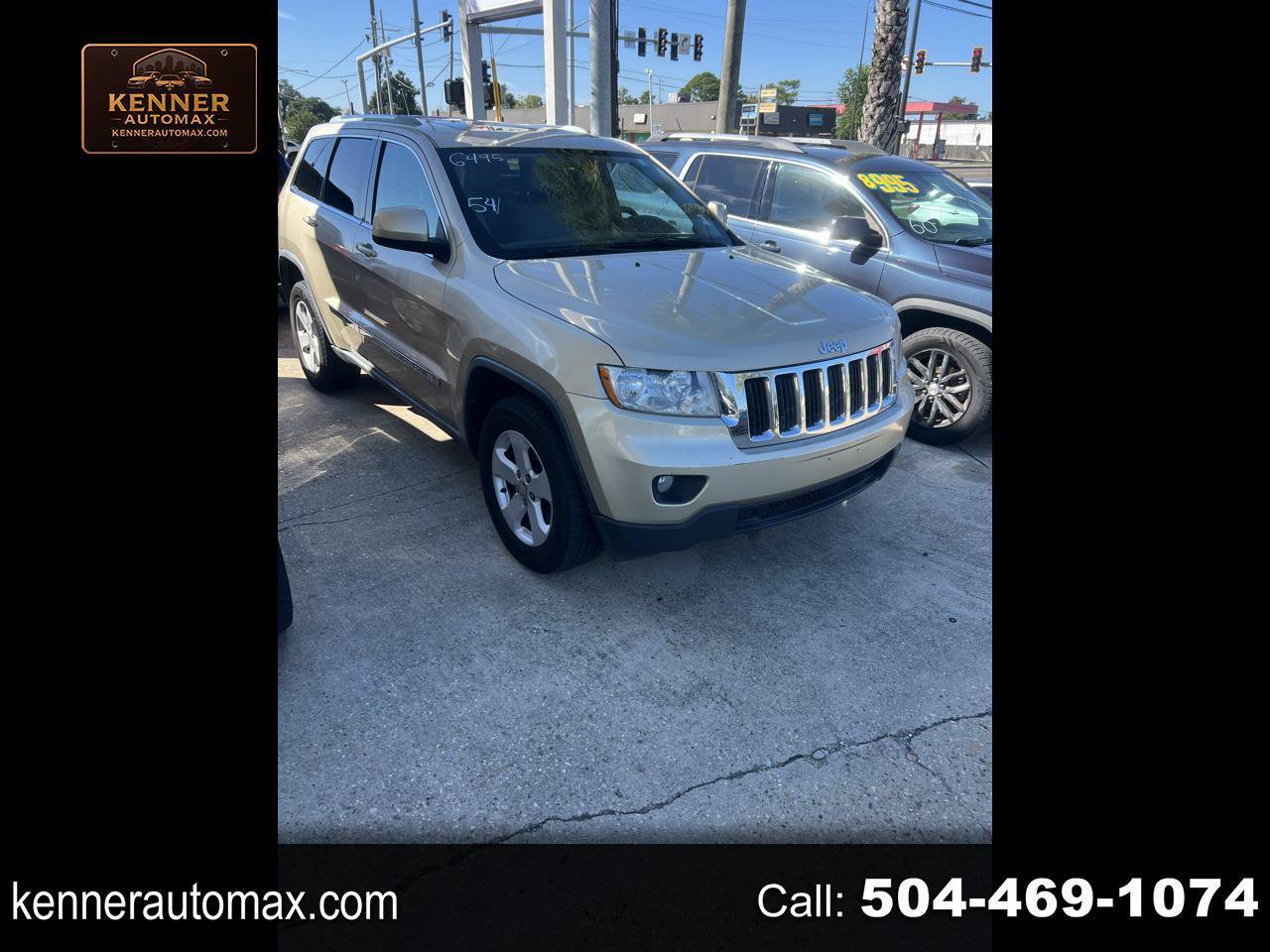 Used 2011 Jeep Grand Cherokee Laredo AWD/4WD image 1