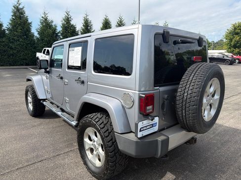 Used 2013 Jeep Wrangler Unlimited Sahara w/ Dual Top Group AWD/4WD image 3