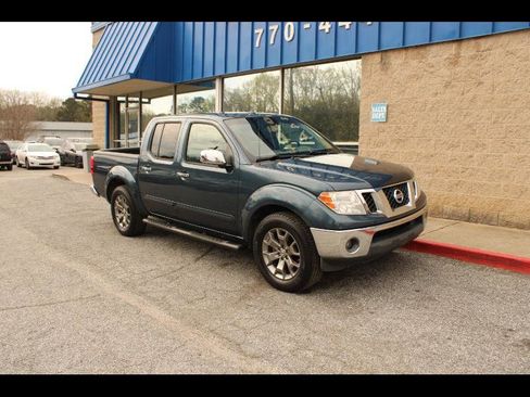 Used 2014 Nissan Frontier SL image 1