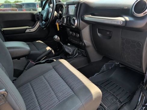 Used 2012 Jeep Wrangler Unlimited Sahara w/ Dual Top Group AWD/4WD image 23