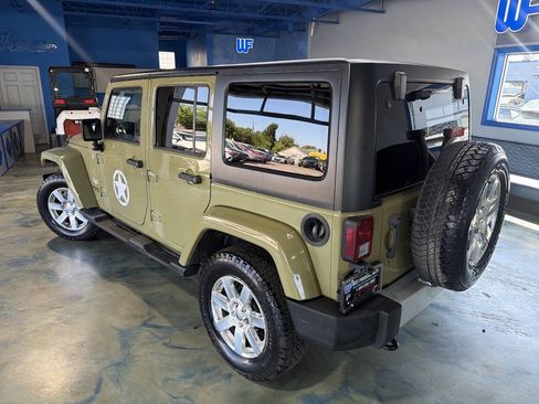 Used 2013 Jeep Wrangler Unlimited Sahara w/ Dual Top Group AWD/4WD image 3