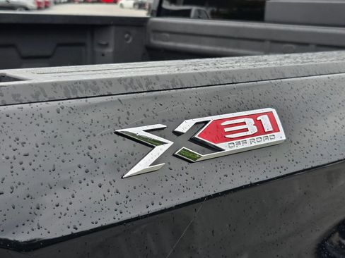 Used 2025 GMC Sierra 1500 SLT w/ SLT Premium Package AWD/4WD image 11