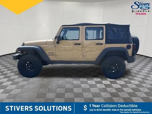 Used 2013 Jeep Wrangler Unlimited Sport w/ Mopar Black Appearance Group AWD/4WD image 11