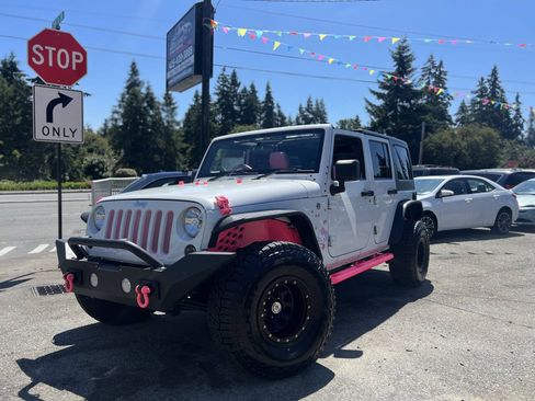 Used 2012 Jeep Wrangler Unlimited Sport AWD/4WD image 2
