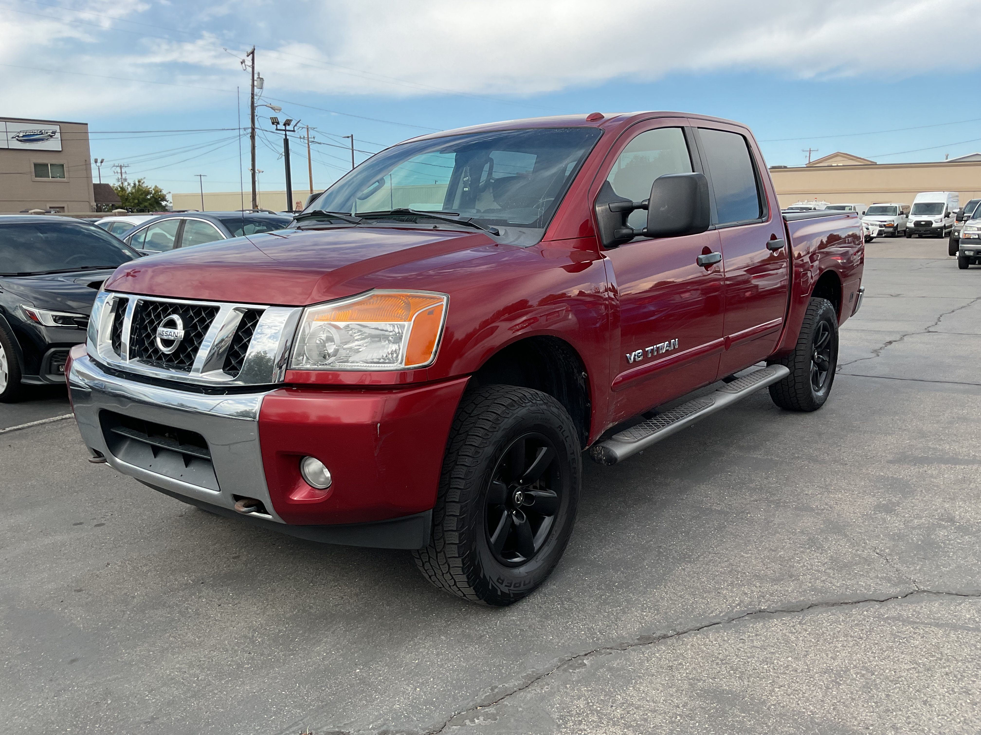 Used 2013 Nissan Titan SV w/ SV Premium Utility Pkg AWD/4WD image 2