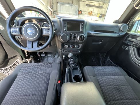 Used 2012 Jeep Wrangler Unlimited Sport AWD/4WD image 28