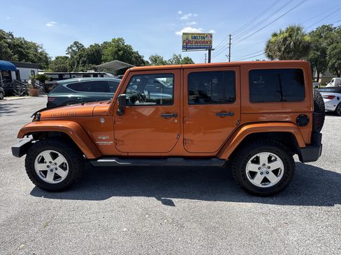 Used 2011 Jeep Wrangler Unlimited Sahara w/ Connectivity Group AWD/4WD image 2