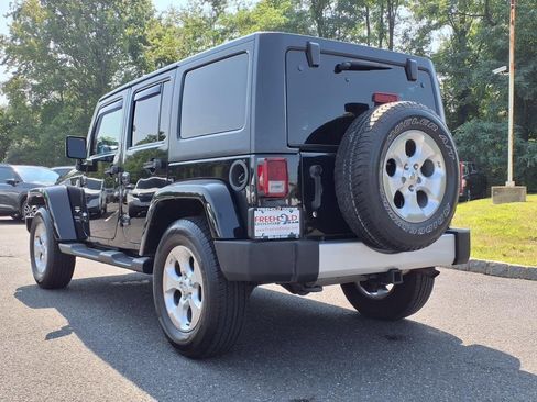 Used 2014 Jeep Wrangler Unlimited Sahara w/ Dual Top Group image 21