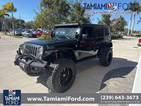Used 2014 Jeep Wrangler Unlimited Sport image 1