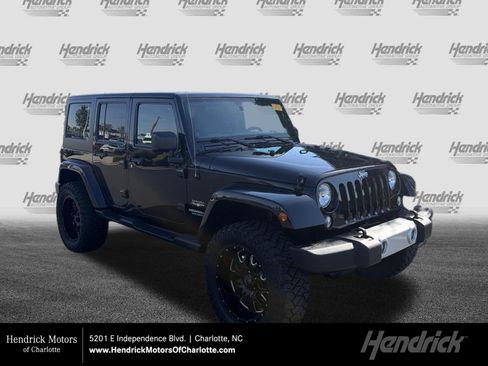 Used 2014 Jeep Wrangler Unlimited Sahara w/ Trailer Tow Group AWD/4WD image 1