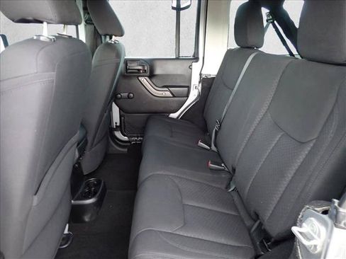 Used 2013 Jeep Wrangler Unlimited Sport w/ Mopar Black Appearance Group AWD/4WD image 9