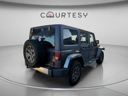 Used 2014 Jeep Wrangler Unlimited Sahara w/ Connectivity Group AWD/4WD image 18