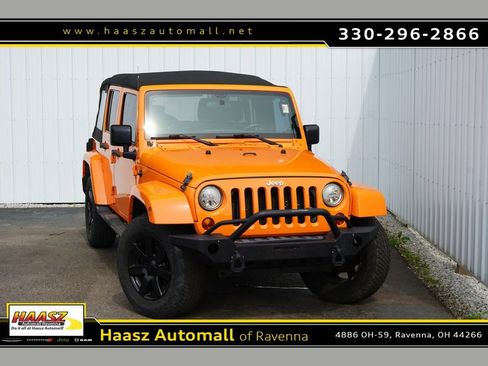 Used 2012 Jeep Wrangler Unlimited Sahara w/ Dual Top Group AWD/4WD image 1