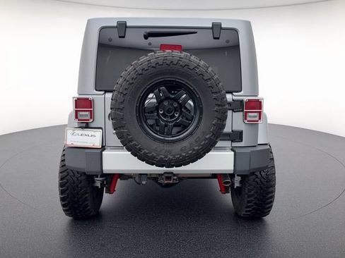 Used 2014 Jeep Wrangler Unlimited Sahara w/ Mopar Chrome Edition Group AWD/4WD image 4