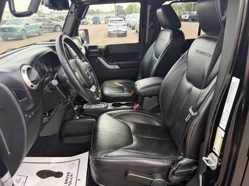 Used 2013 Jeep Wrangler Unlimited Rubicon w/ Dual Top Group AWD/4WD image 9
