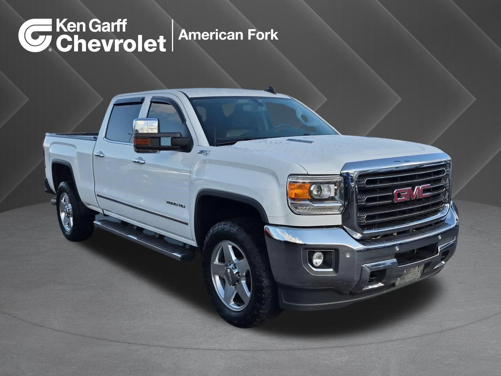Used 2015 GMC Sierra 2500 SLT w/ Duramax Plus Package AWD/4WD image 1