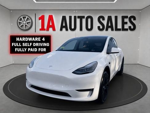 Used 2024 Tesla Model Y Long Range AWD/4WD image 1
