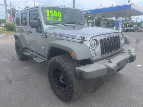 Used 2014 Jeep Wrangler Unlimited Rubicon w/ Dual Top Group AWD/4WD image 8