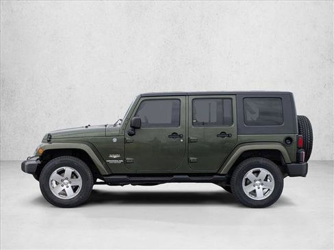 Used 2009 Jeep Wrangler Unlimited Sahara w/ Dual Top Group AWD/4WD image 9