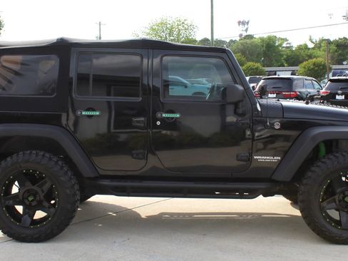 Used 2013 Jeep Wrangler Unlimited Rubicon w/ Dual Top Group AWD/4WD image 6