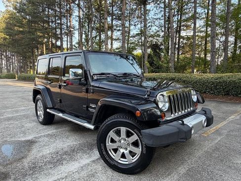 Used 2013 Jeep Wrangler Unlimited Sahara w/ Dual Top Group image 14