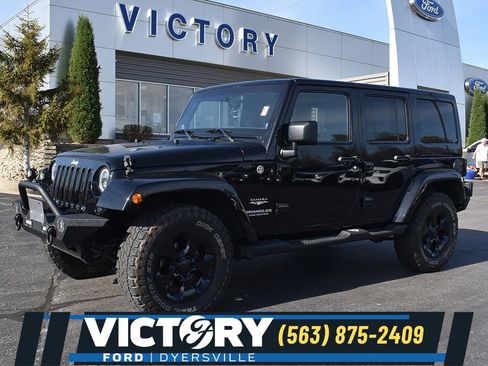 Used 2012 Jeep Wrangler Unlimited Sahara AWD/4WD image 1