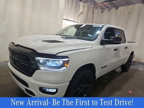 Used 2023 RAM 1500 Laramie AWD/4WD image 1