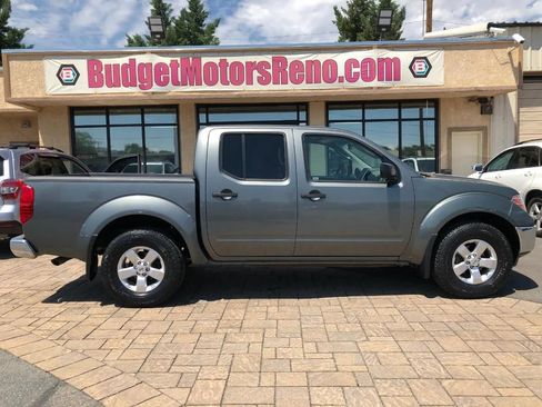 Used 2009 Nissan Frontier SE w/ SE Value Truck Pkg AWD/4WD image 1