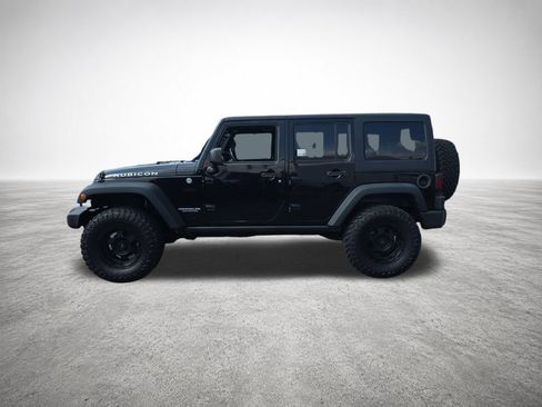Used 2015 Jeep Wrangler Unlimited Rubicon w/ Dual Top Group AWD/4WD image 5