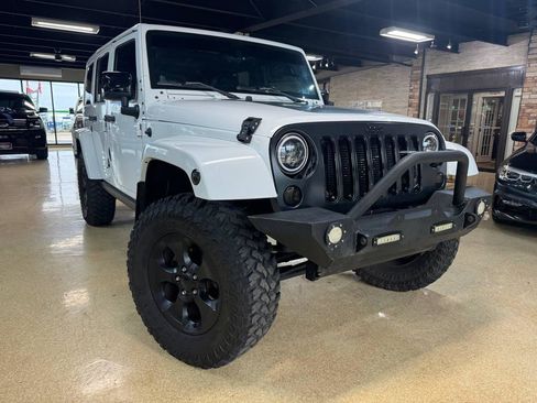 Used 2014 Jeep Wrangler Unlimited Sahara AWD/4WD image 1
