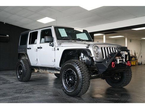Used 2013 Jeep Wrangler Unlimited Sport AWD/4WD image 1