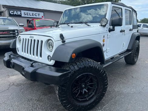 Used 2014 Jeep Wrangler Unlimited Sport w/ Connectivity Group AWD/4WD image 1