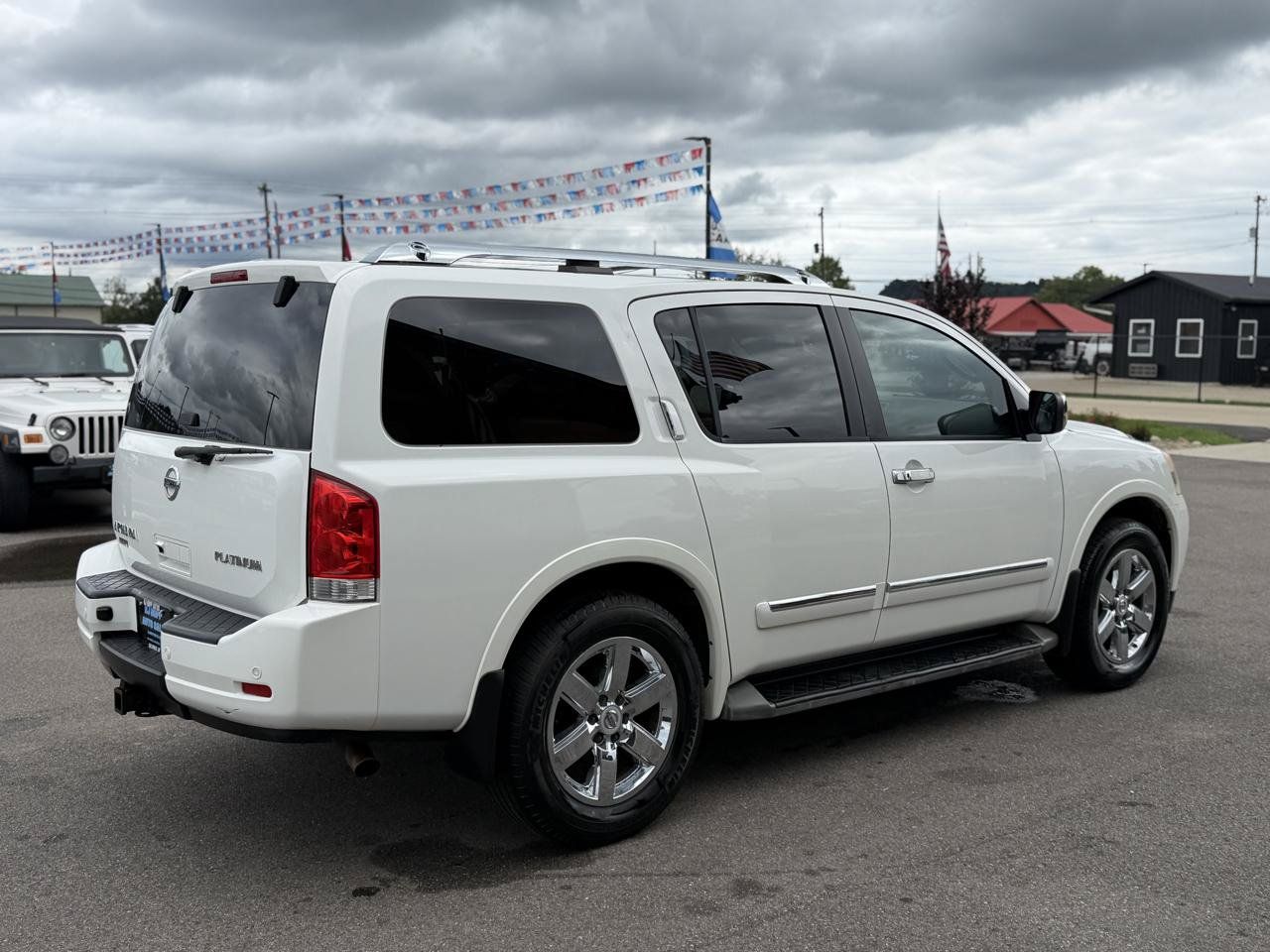 Used 2011 Nissan Armada Platinum w/ 2nd Row Captain Seat Pkg AWD/4WD image 4