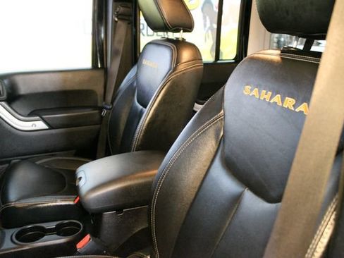 Used 2013 Jeep Wrangler Unlimited Sahara w/ Dual Top Group AWD/4WD image 13