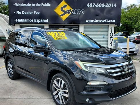 Used 2016 Honda Pilot Touring image 1