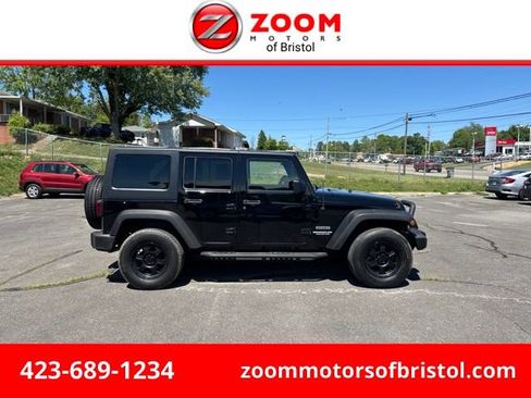 Used 2011 Jeep Wrangler Unlimited Sport AWD/4WD image 1