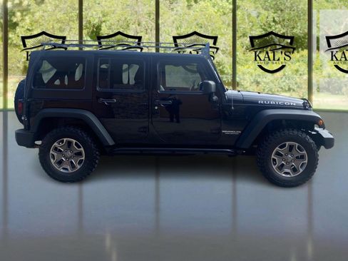 Used 2013 Jeep Wrangler Unlimited Rubicon w/ Dual Top Group AWD/4WD image 4