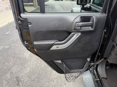Used 2015 Jeep Wrangler Unlimited Sahara w/ Dual Top Group AWD/4WD image 15