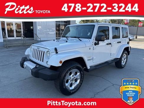 Used 2014 Jeep Wrangler Unlimited Sahara w/ Max Tow Package image 1