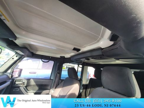 Used 2015 Jeep Wrangler Unlimited Sport w/ Dual Top Group AWD/4WD image 11