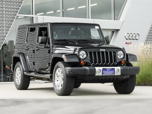 Used 2013 Jeep Wrangler Unlimited Sahara w/ Dual Top Group image 1