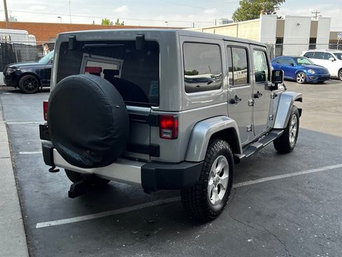 Used 2015 Jeep Wrangler Unlimited Sahara w/ Dual Top Group AWD/4WD image 7