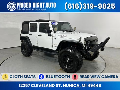 Used 2014 Jeep Wrangler Unlimited Sahara image 1