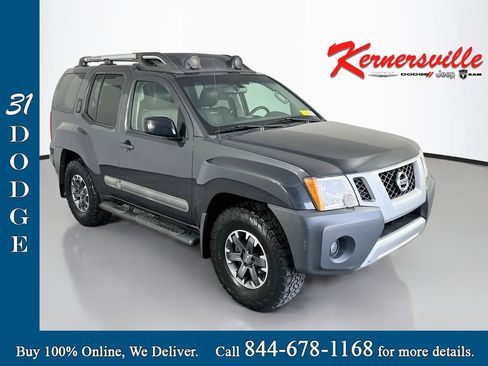 Used 2015 Nissan Xterra S AWD/4WD image 1