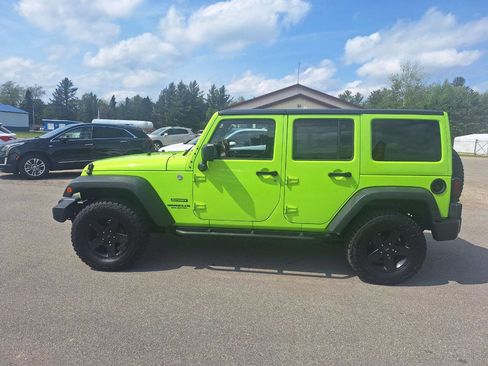 Used 2013 Jeep Wrangler Unlimited Sport AWD/4WD image 1